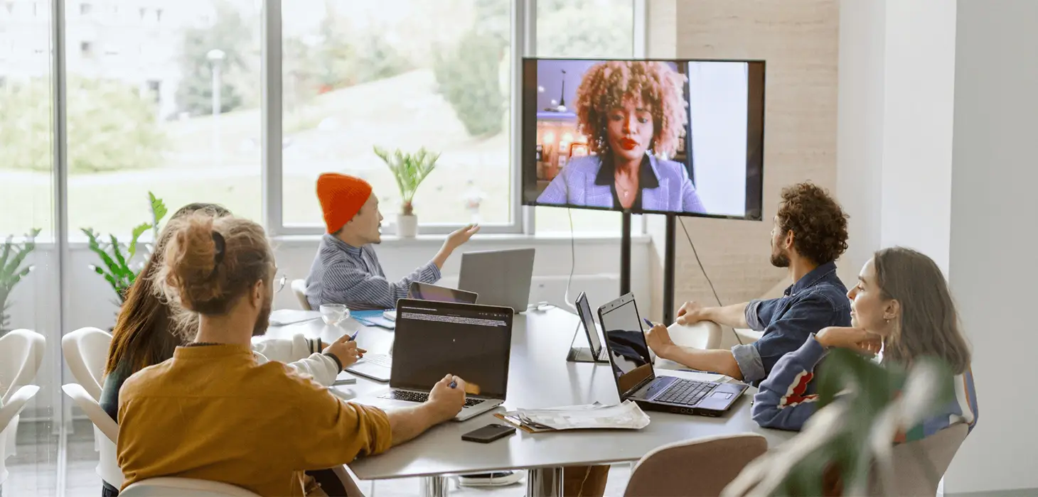 Office meeting with a video call presentation