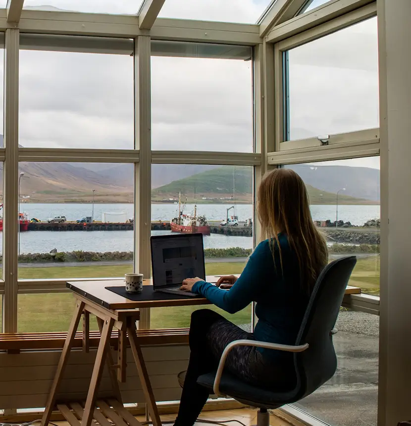 A woman working on her laptop